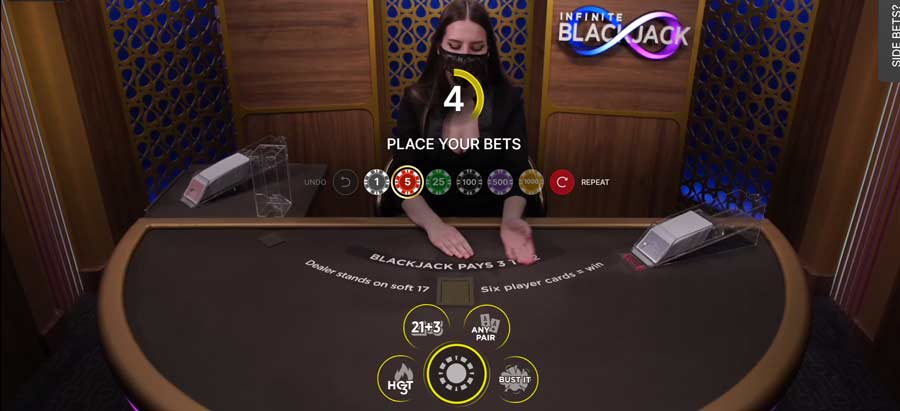 Placing bets at the Infinite Blackjack live table